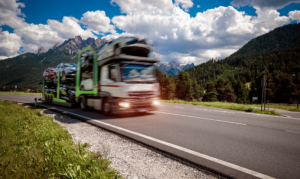 Motion Blur Shot of Semi Truck Shipping Cars